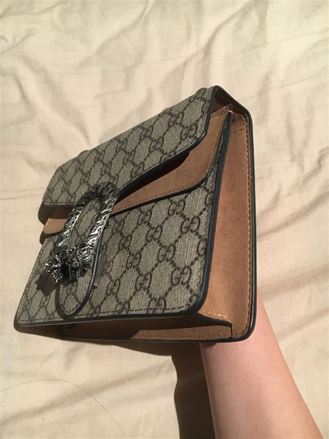 dinosaur gucci bag|Gucci dionysis bag.